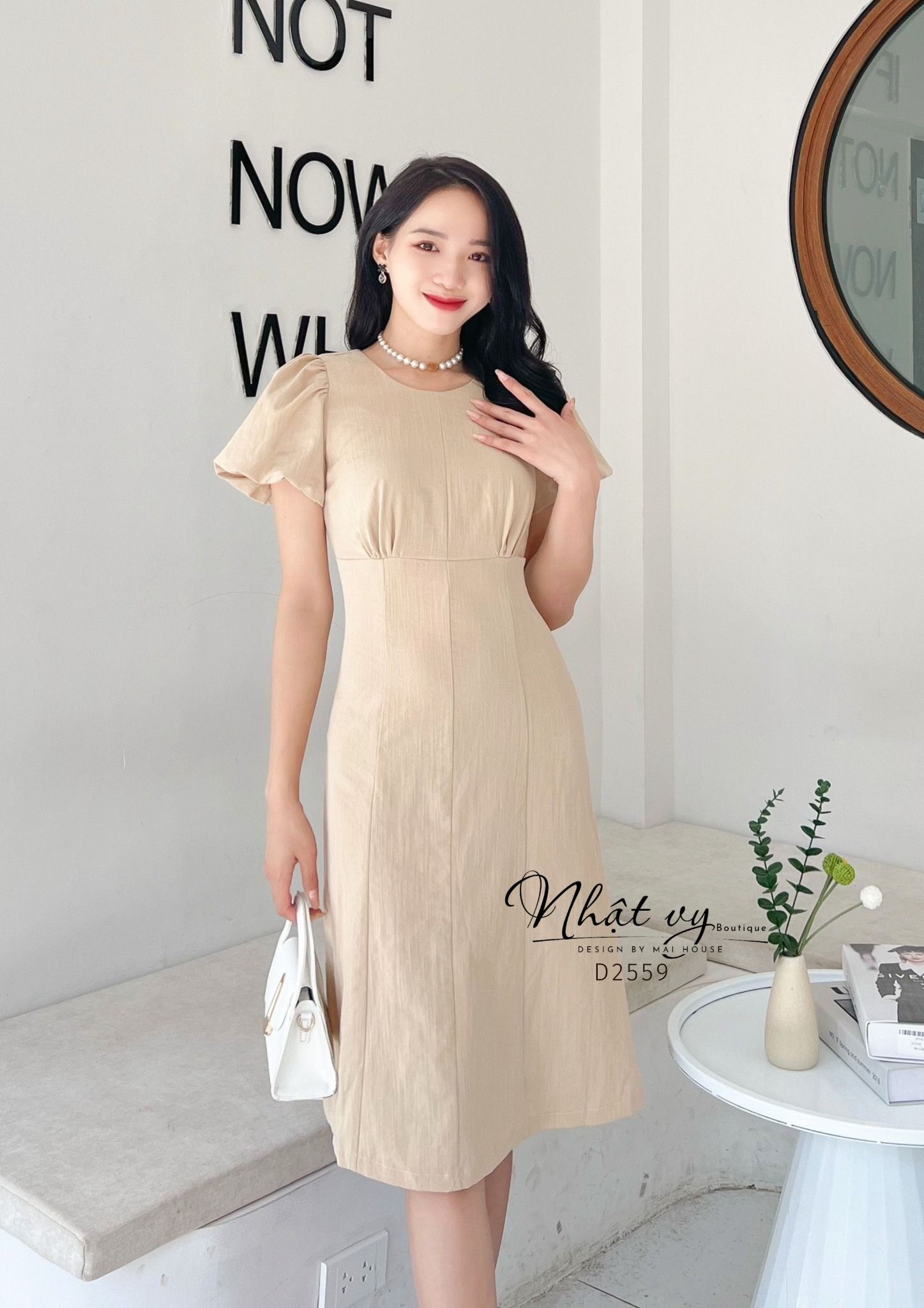Đầm nhún ngực cổ tròn tay bí dáng ôm - D2559