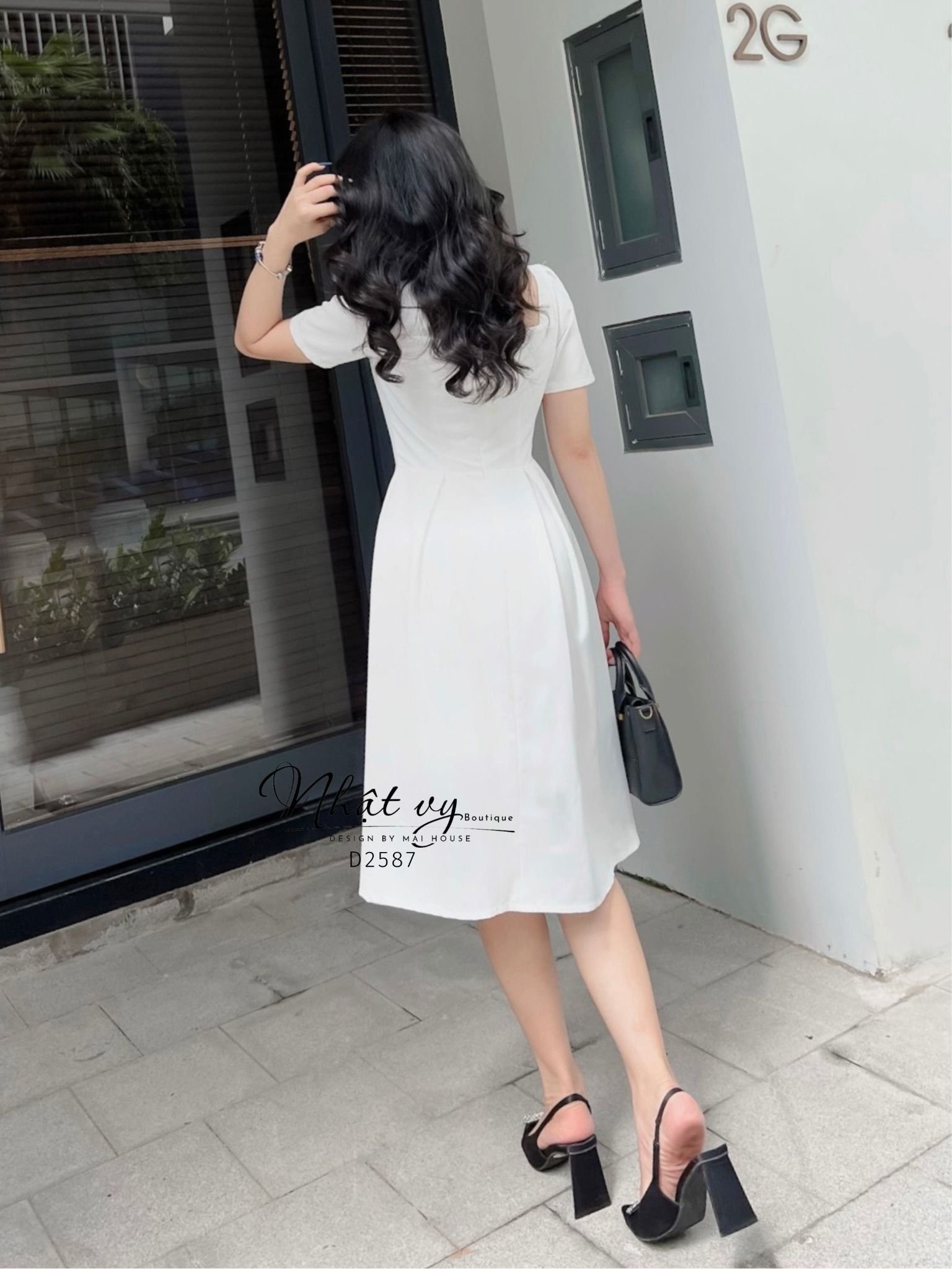 Đầm cổ vuông dáng xoè ngực đính nơ cách điệu - D2587
