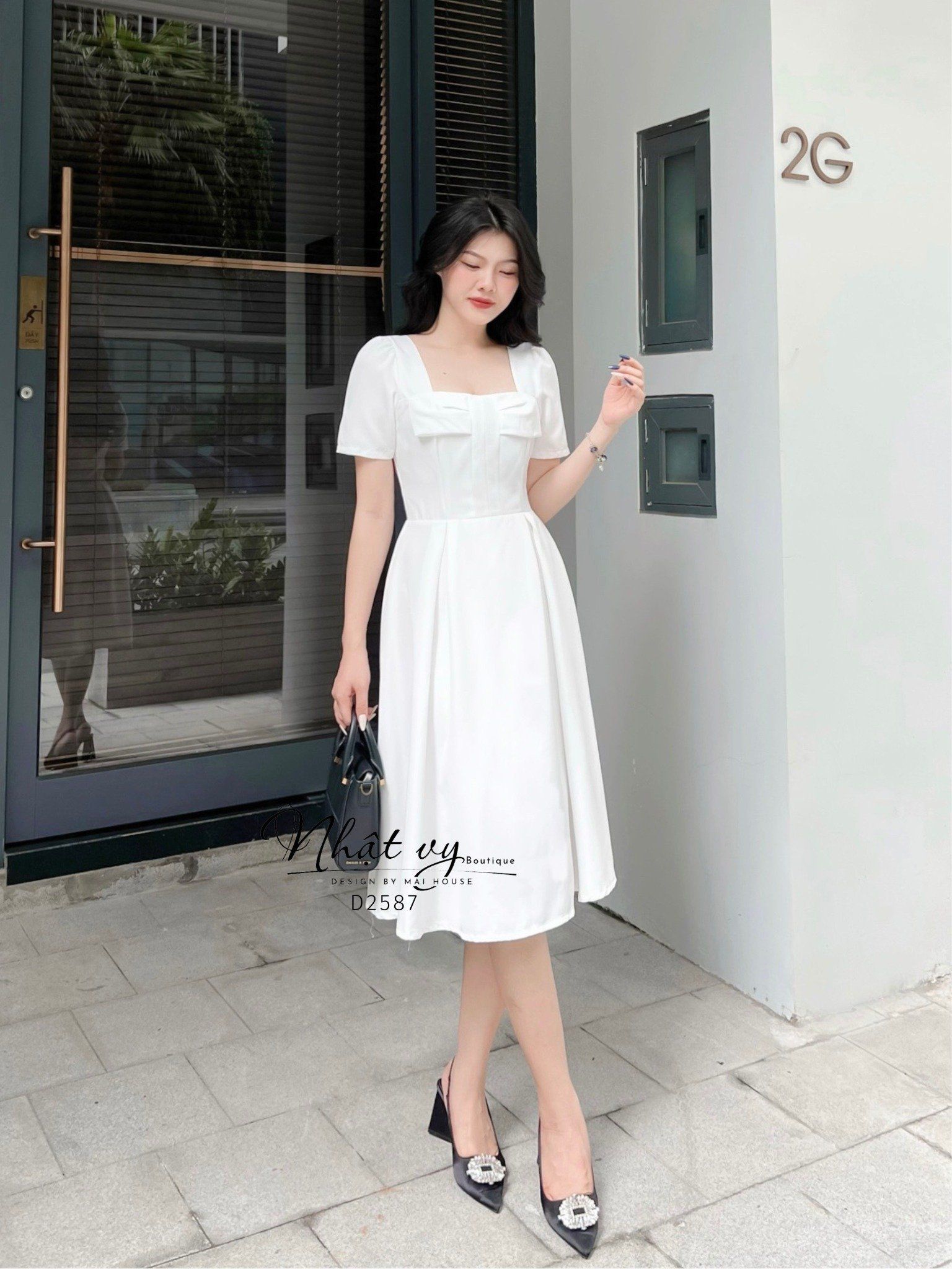 Đầm cổ vuông dáng xoè ngực đính nơ cách điệu - D2587