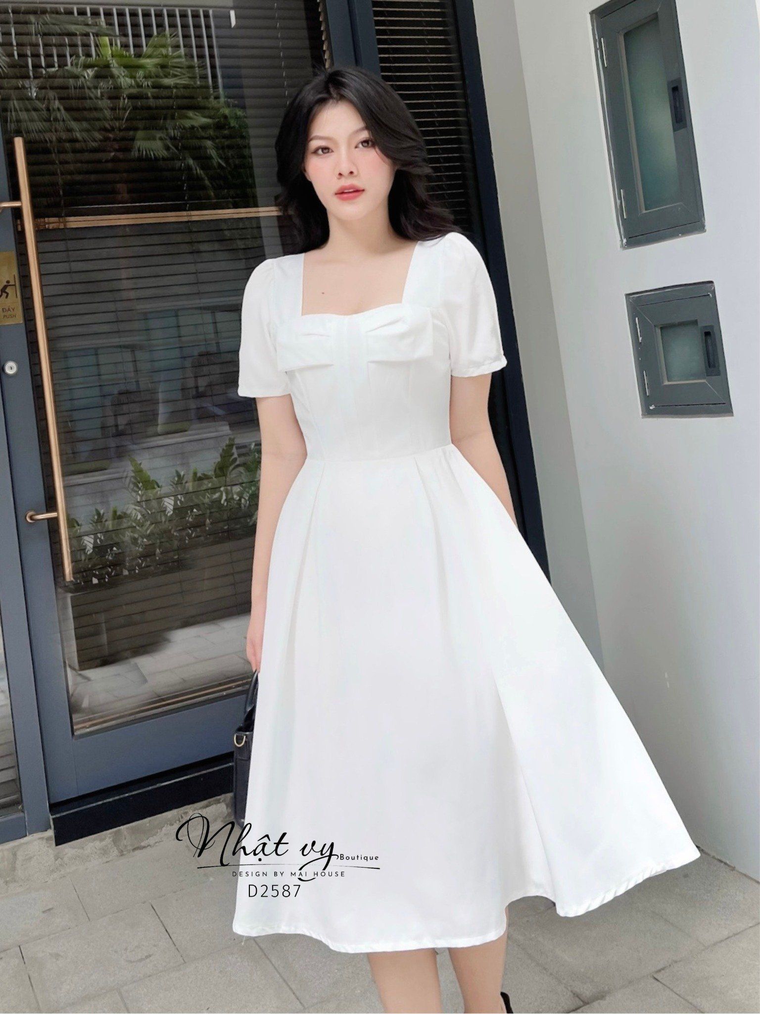 Đầm cổ vuông dáng xoè ngực đính nơ cách điệu - D2587