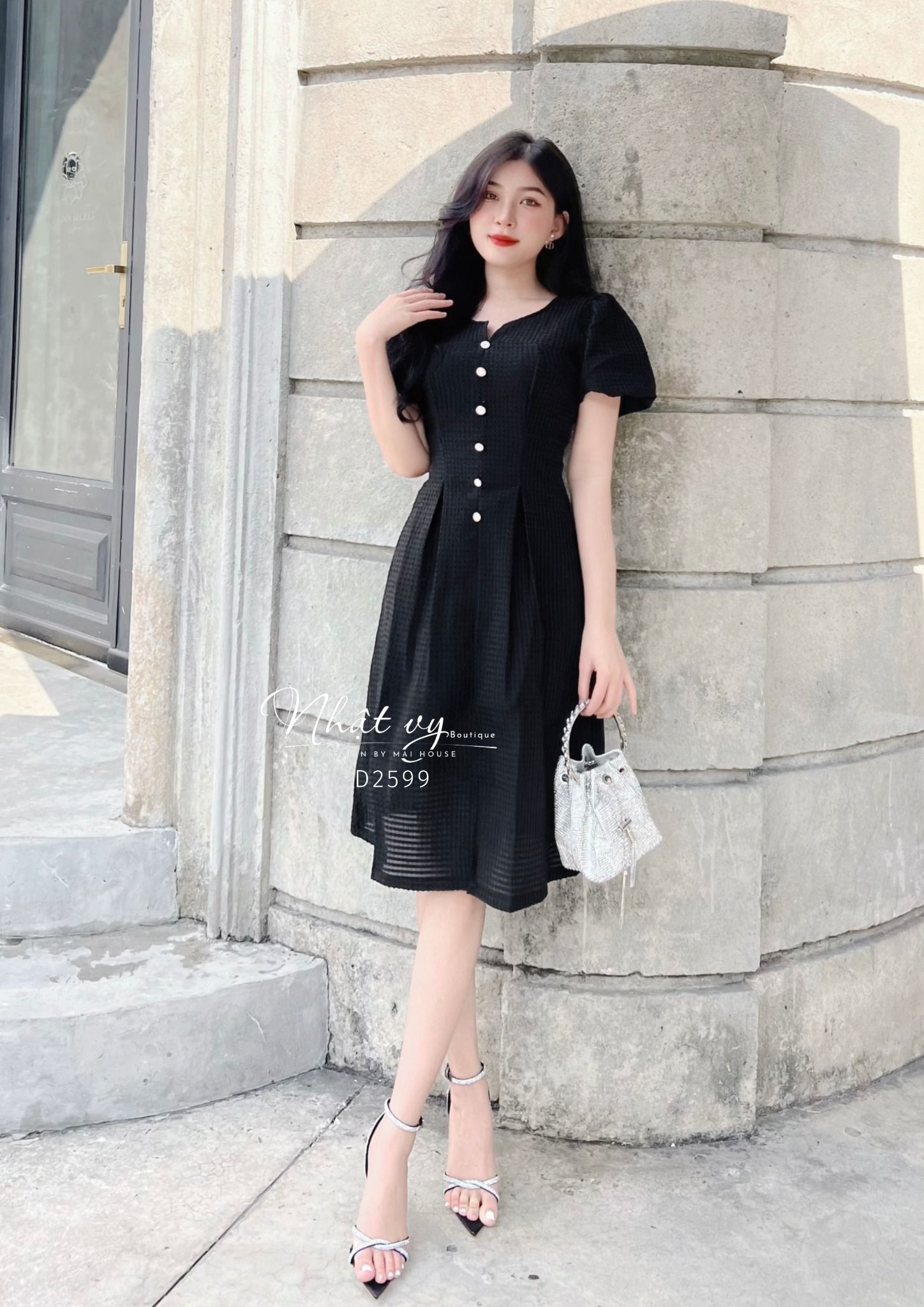 Đầm xốp cổ tròn cách điệu tay bí đính cúc giả - D2599
