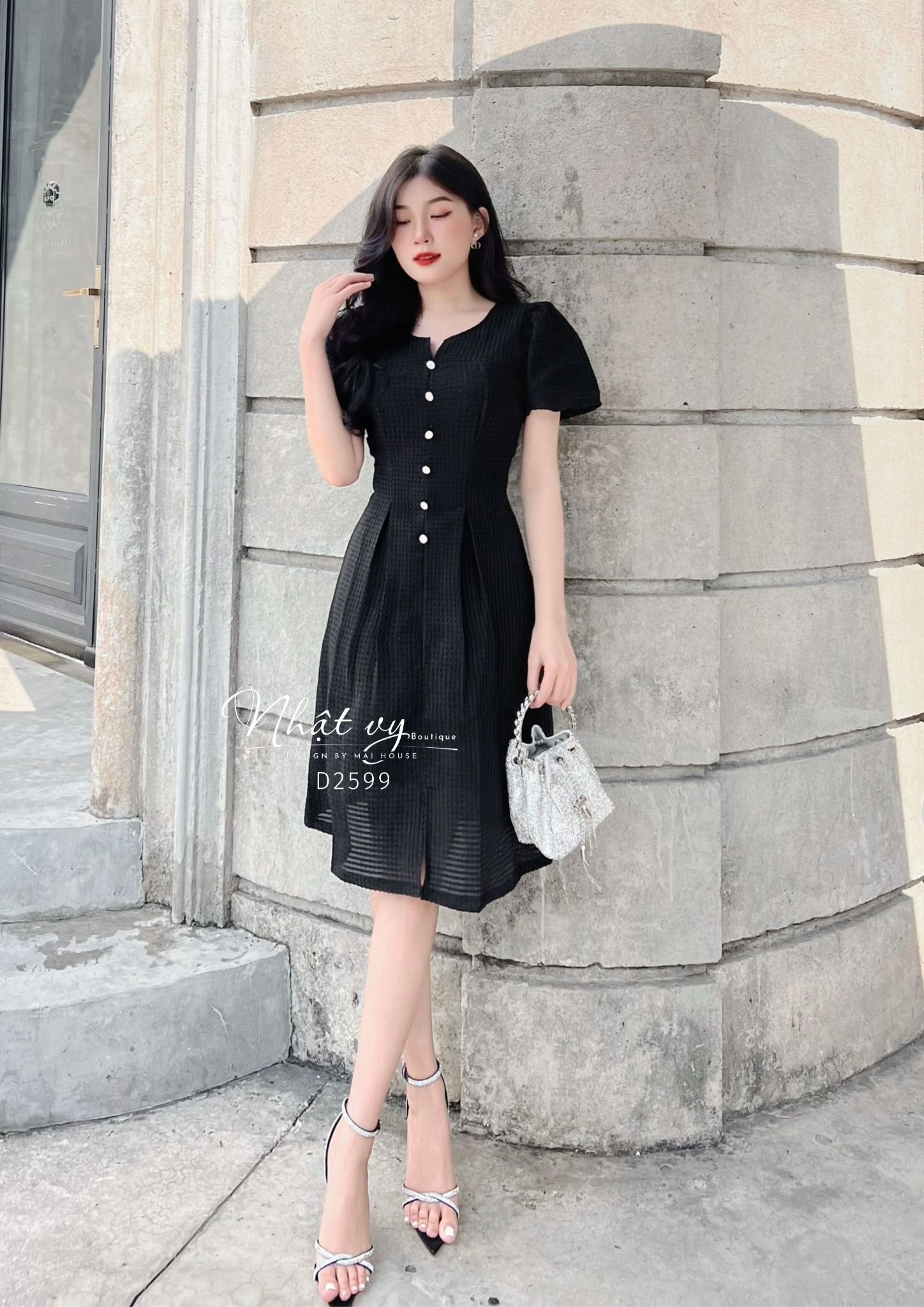 Đầm xốp cổ tròn cách điệu tay bí đính cúc giả - D2599