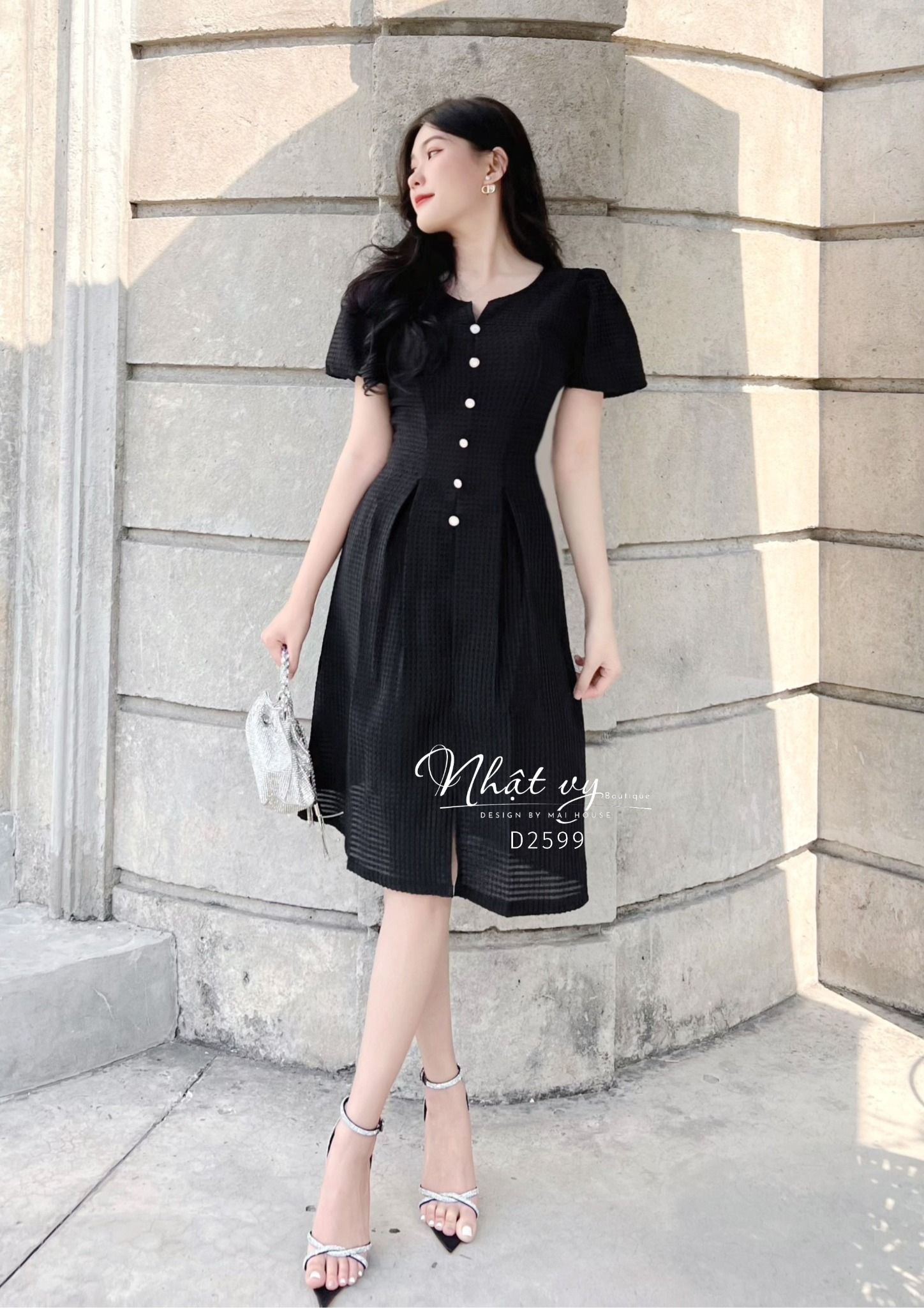 Đầm xốp cổ tròn cách điệu tay bí đính cúc giả - D2599