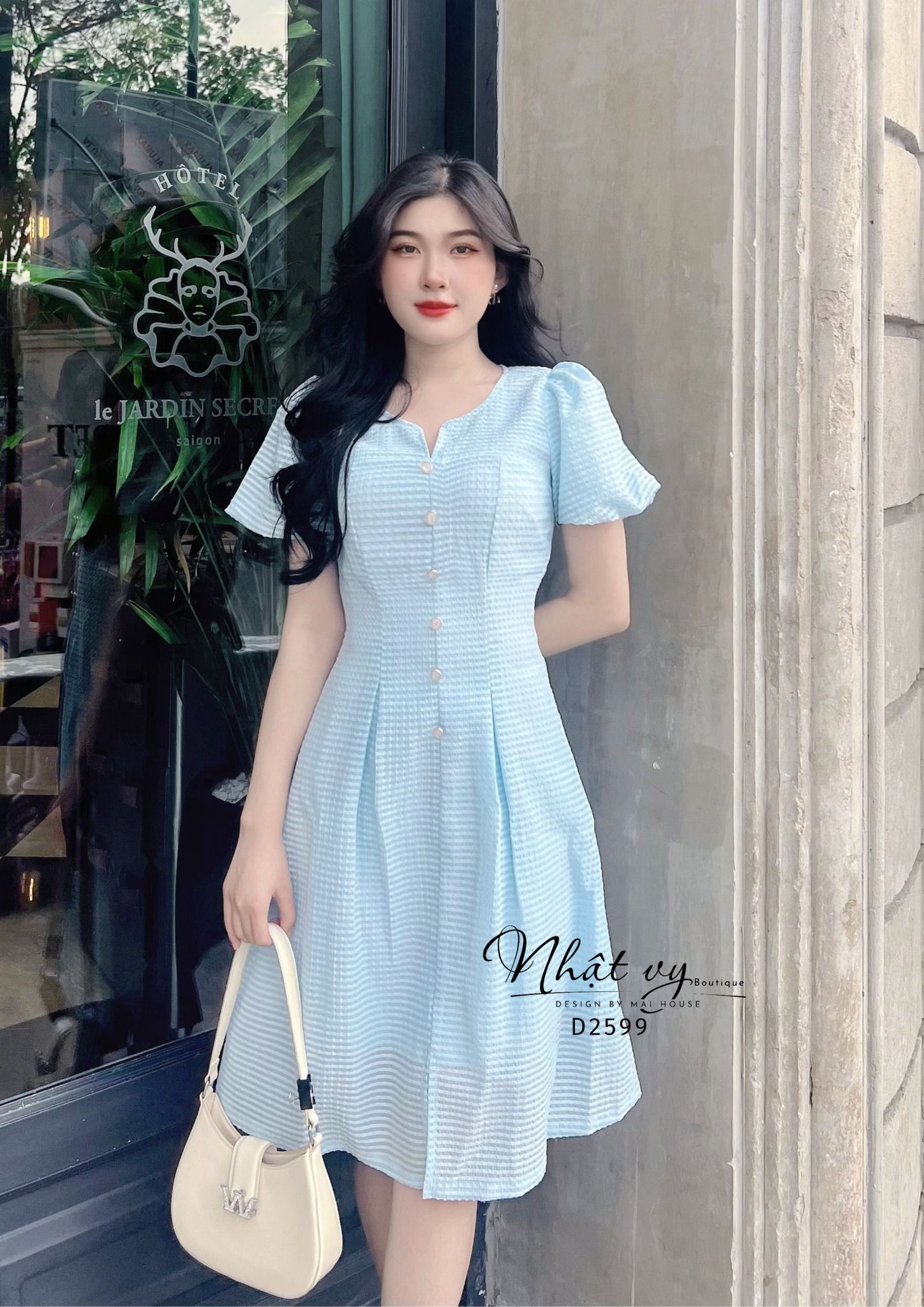 Đầm xốp cổ tròn cách điệu tay bí đính cúc giả - D2599