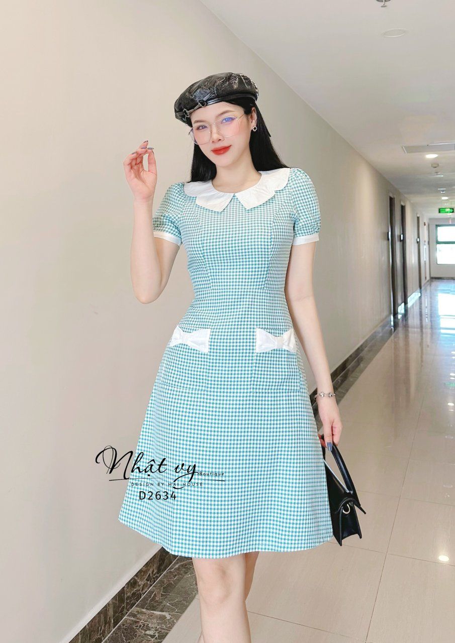 Đầm caro nhí cổ tròn tay phồng phối túi - D2634