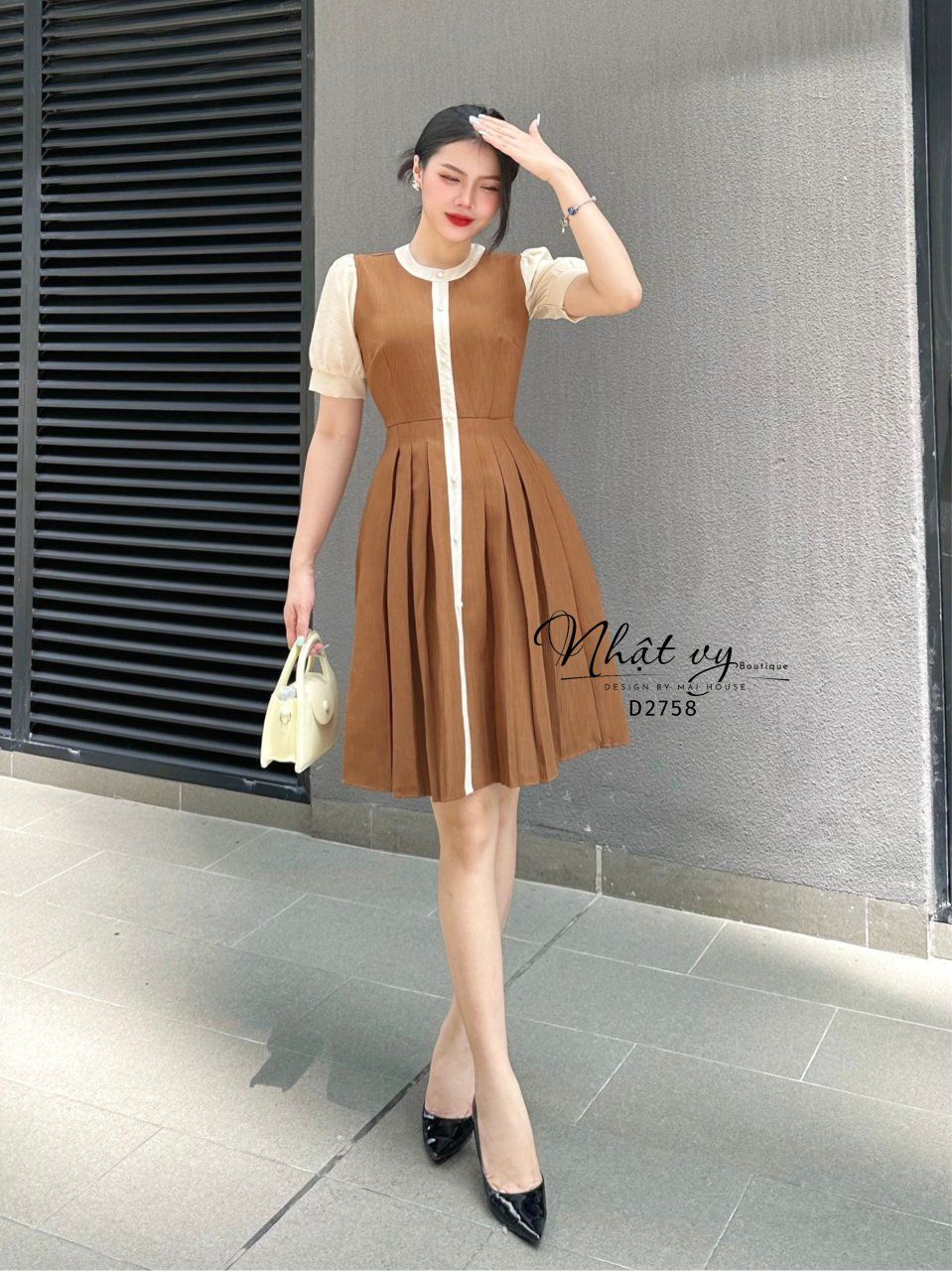 Đầm xốp cổ tròn đính cúc giả - D2758