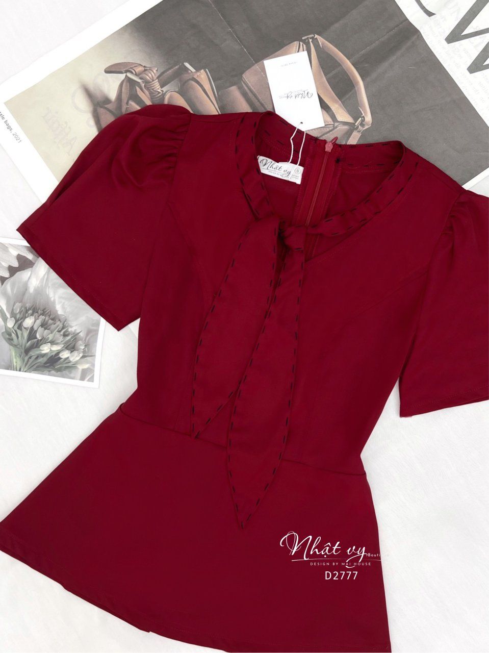 Áo peplum thắt nơ viền chỉ nổi - D2777