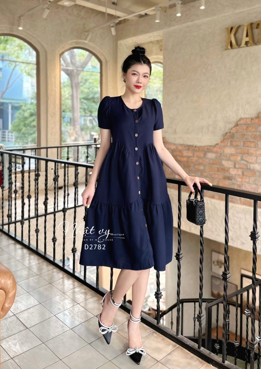 Đầm babydoll nhún cách điệu phối cúc giả - D2782