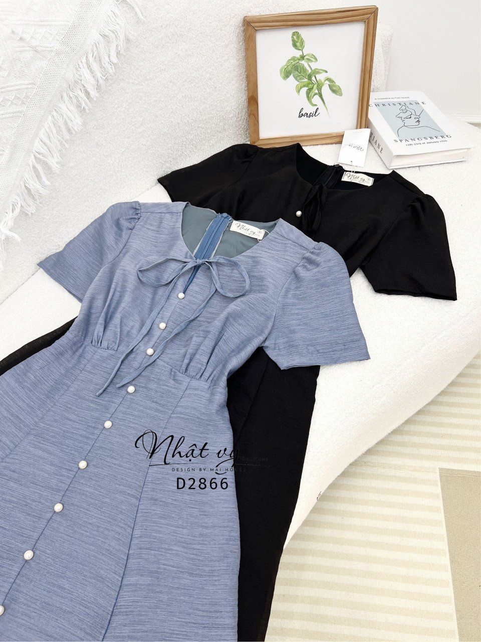 Đầm nhún ngực cổ tròn thắt nơ đính nút ngọc - D2866
