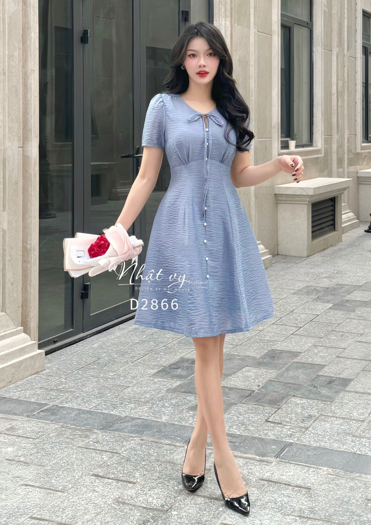 Đầm nhún ngực cổ tròn thắt nơ đính nút ngọc - D2866