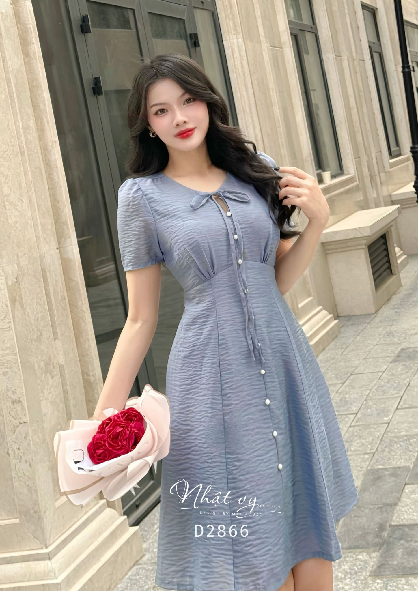 Đầm nhún ngực cổ tròn thắt nơ đính nút ngọc - D2866