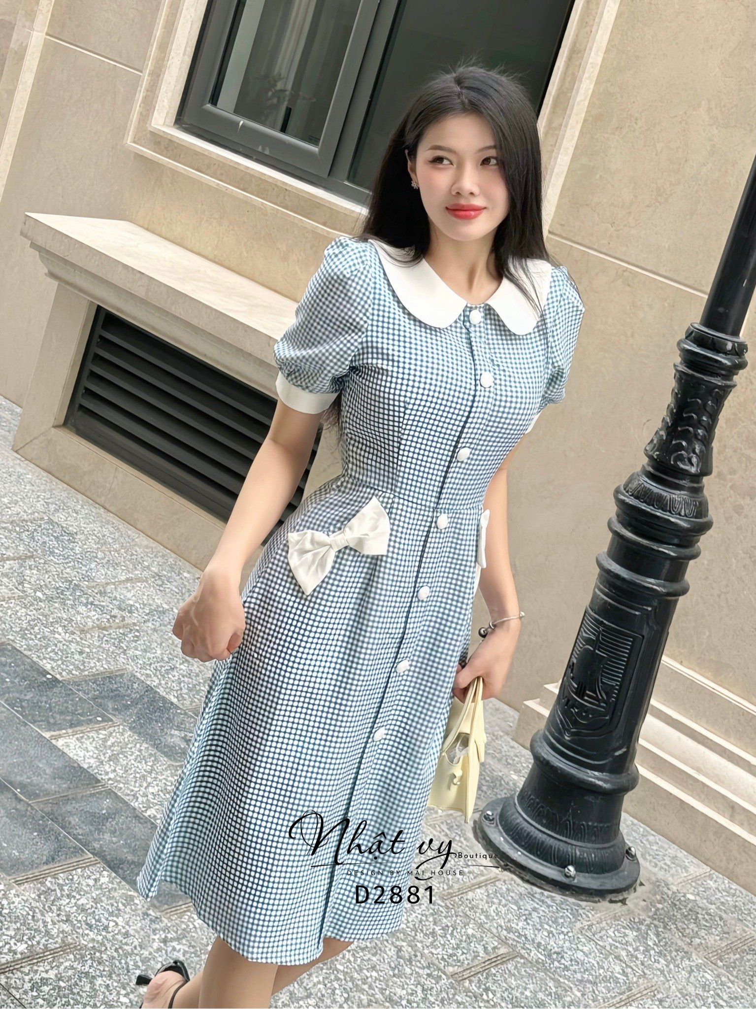 Đầm caro cổ tròn bèo đính nơ bên túi - D2881