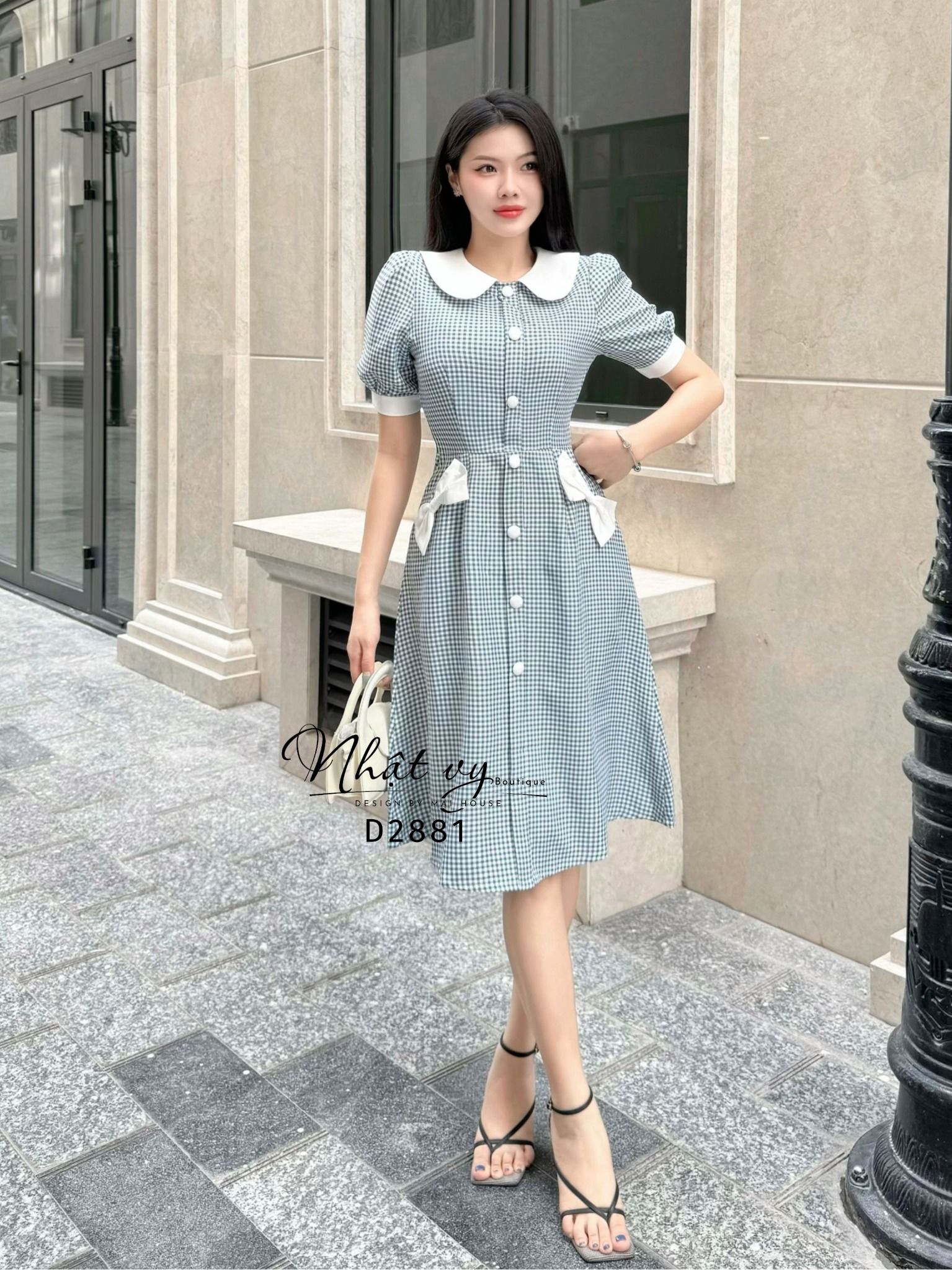 Đầm caro cổ tròn bèo đính nơ bên túi - D2881