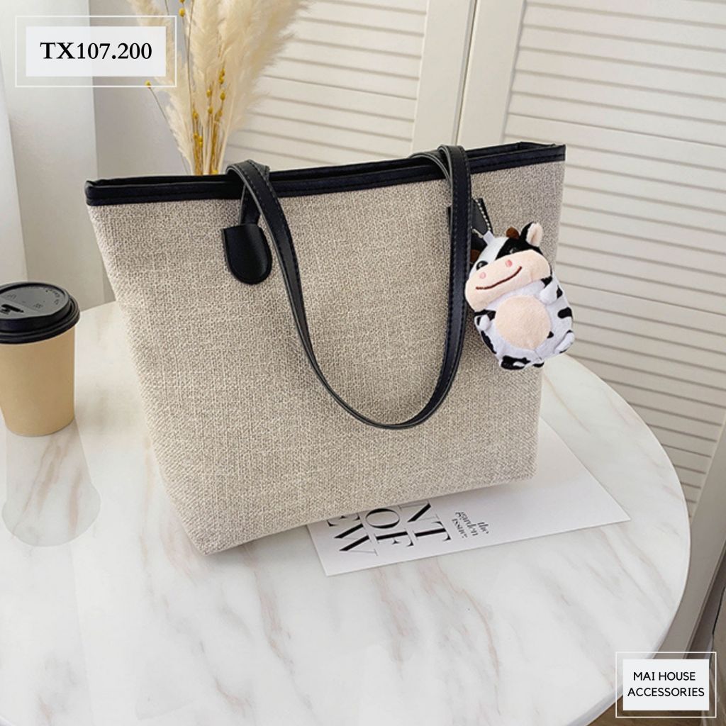 TÚI TRƠN FORM TO + MÓC KHOÁ BÒ SỮA - TX107