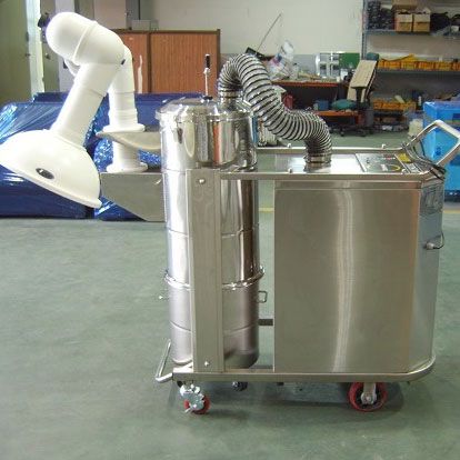 Pharmaceutical tableting machine dust collecting
