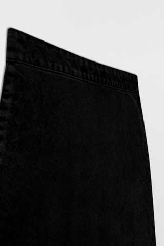 Chân váy midi denim black xéo canh