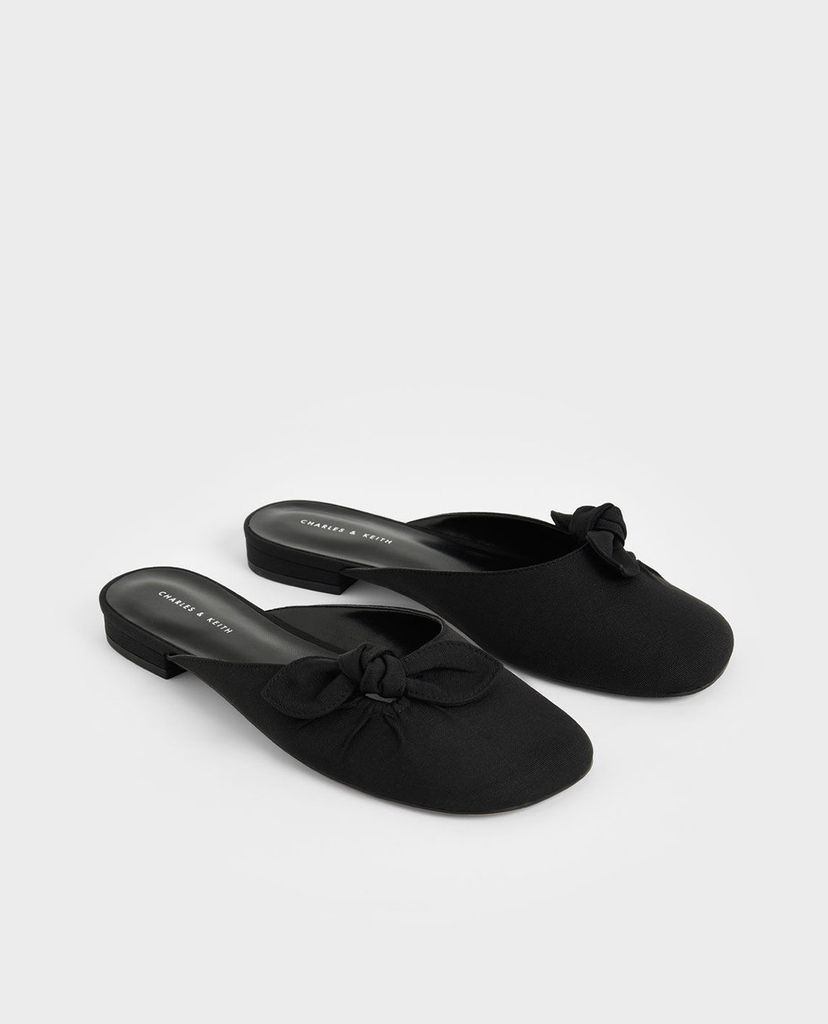 CHARLES & KEITH - Giày mules nữ mũi tròn Knotted Fabric