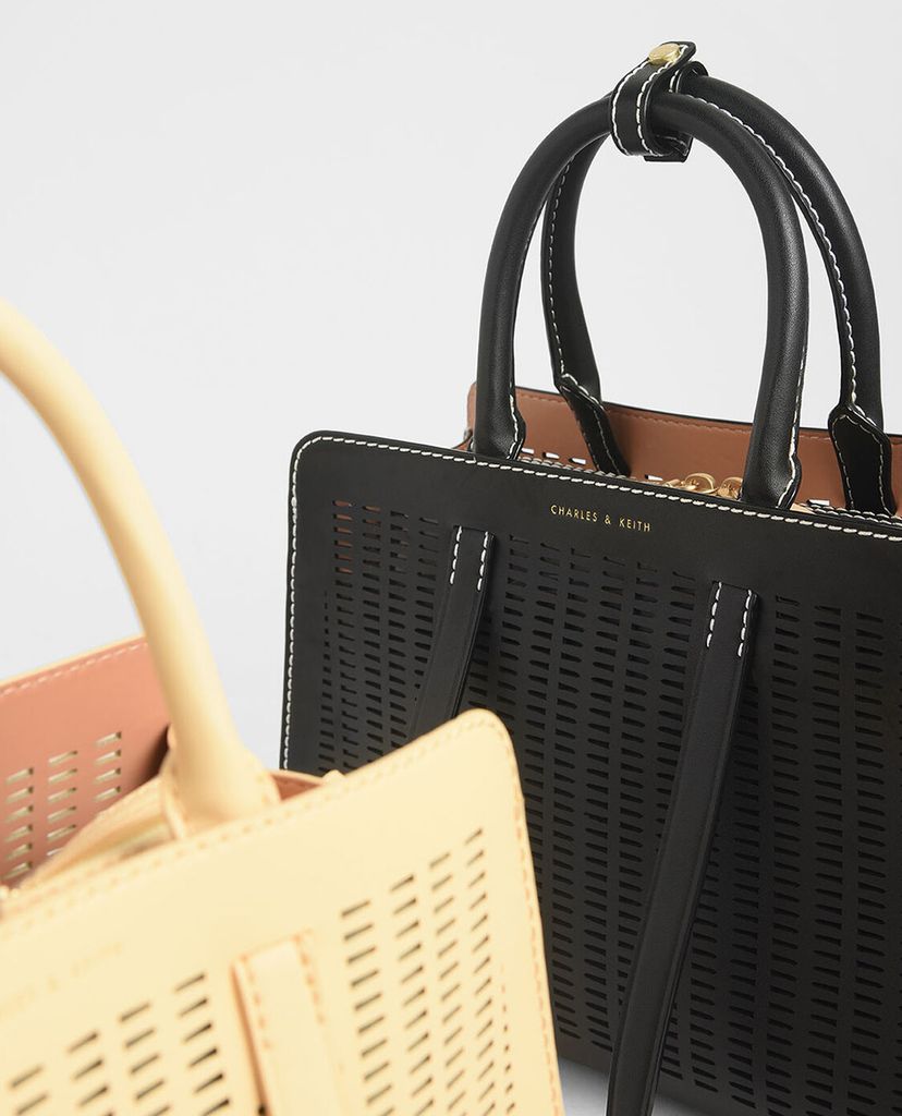 CHARLES & KEITH - Túi xách tay hình thang Large Laser Cut