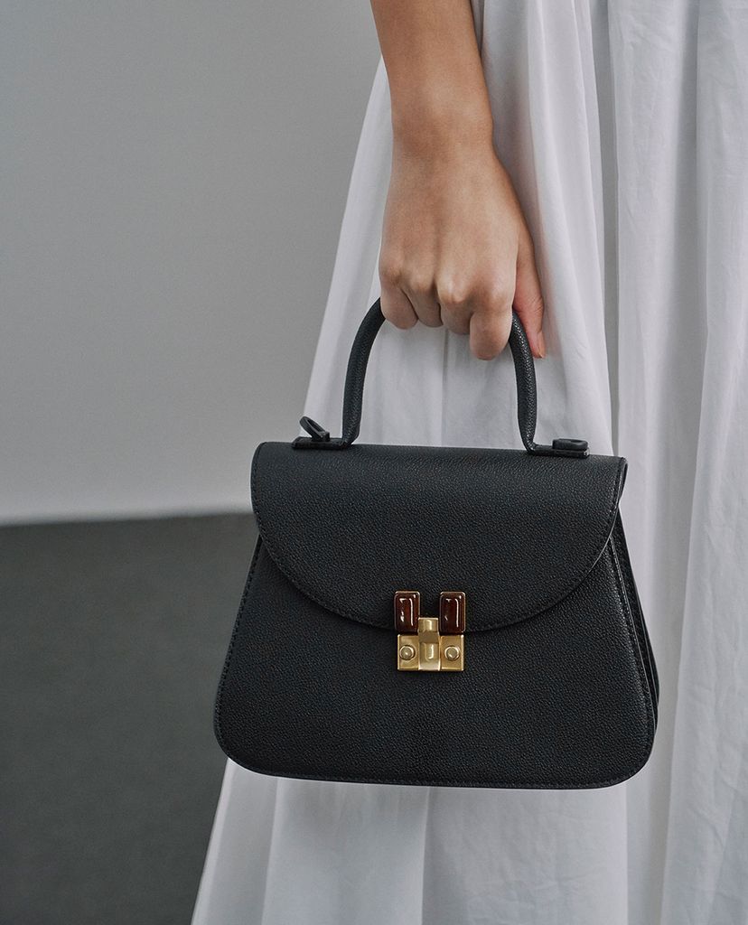 CHARLES & KEITH - Túi xách tay nữ hình thang Embellished Sculptural