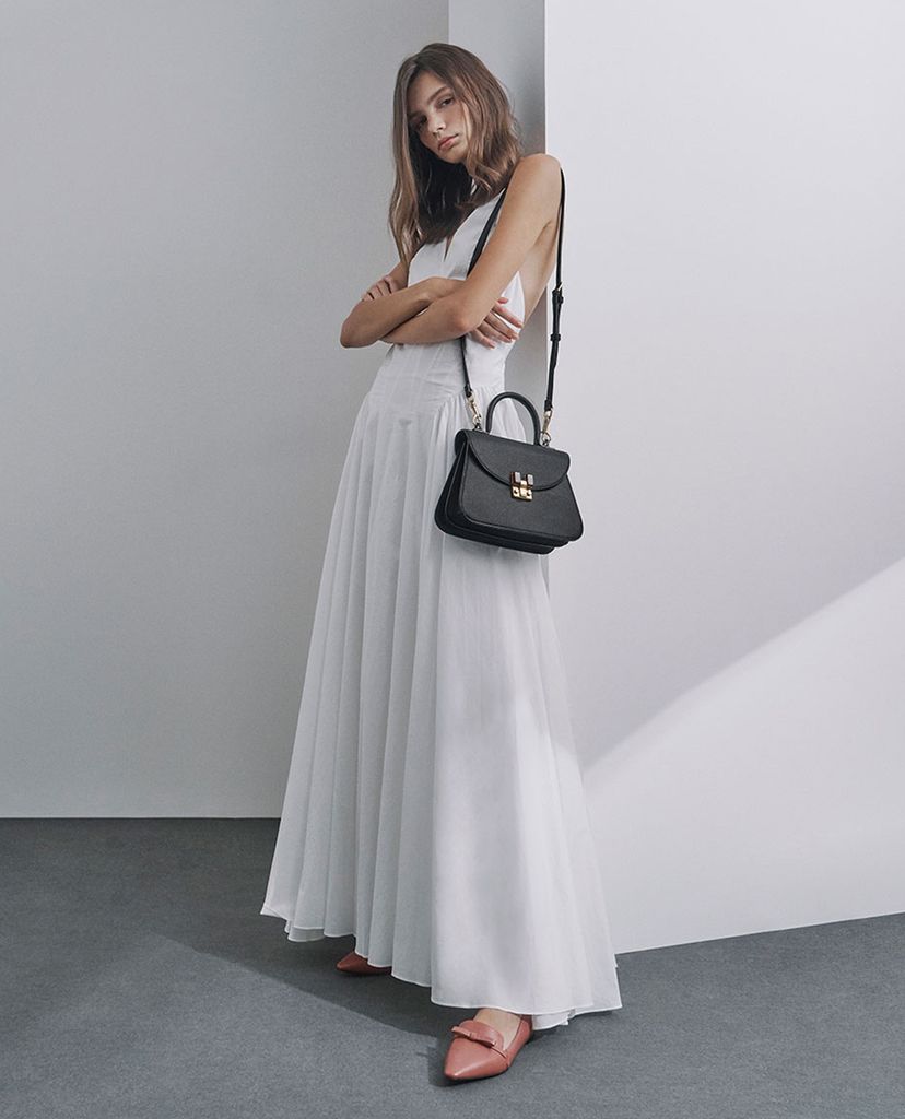 CHARLES & KEITH - Túi xách tay nữ hình thang Embellished Sculptural