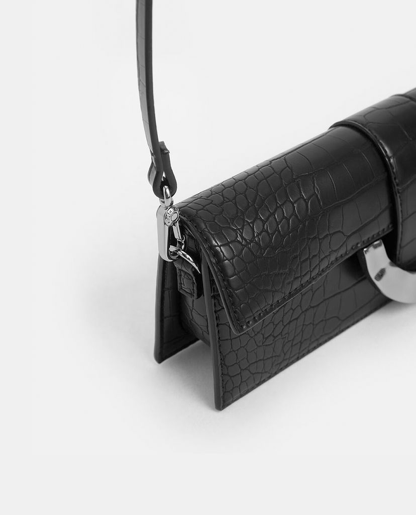 CHARLES & KEITH - Ví cầm tay nữ dáng dài Croc Effect
