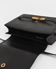 CHARLES & KEITH - Túi đeo chéo nữ Metallic Push Lock Crossbody Bag