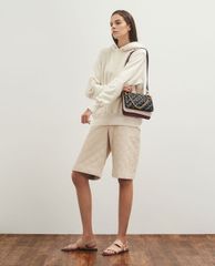 CHARLES & KEITH - Túi đeo chéo nữ tay cầm bằng kim loại thời trang