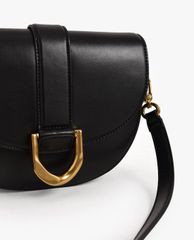 CHARLES & KEITH - Túi đeo vai nữ Metallic Buckle Saddle