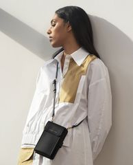 CHARLES & KEITH - Ví cầm tay nữ chữ nhật phối dây Elongated Pouch
