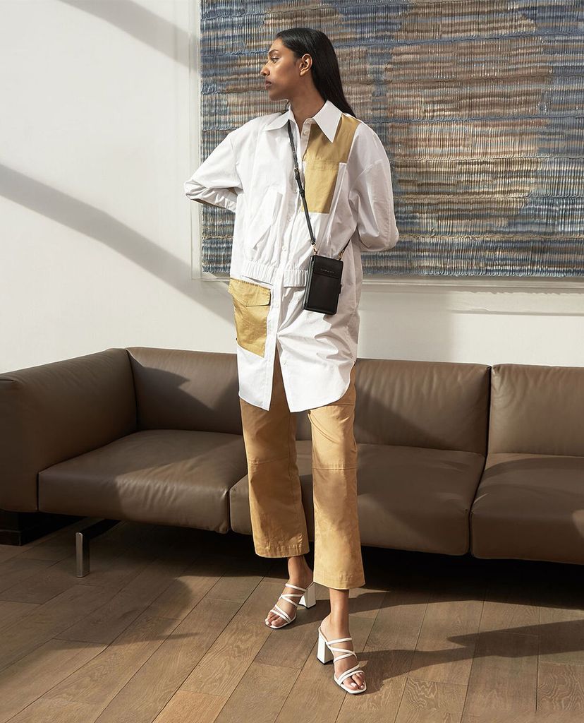 CHARLES & KEITH - Ví cầm tay nữ chữ nhật phối dây Elongated Pouch
