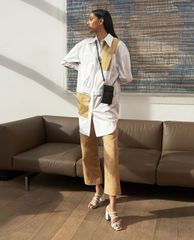 CHARLES & KEITH - Ví cầm tay nữ chữ nhật phối dây Elongated Pouch