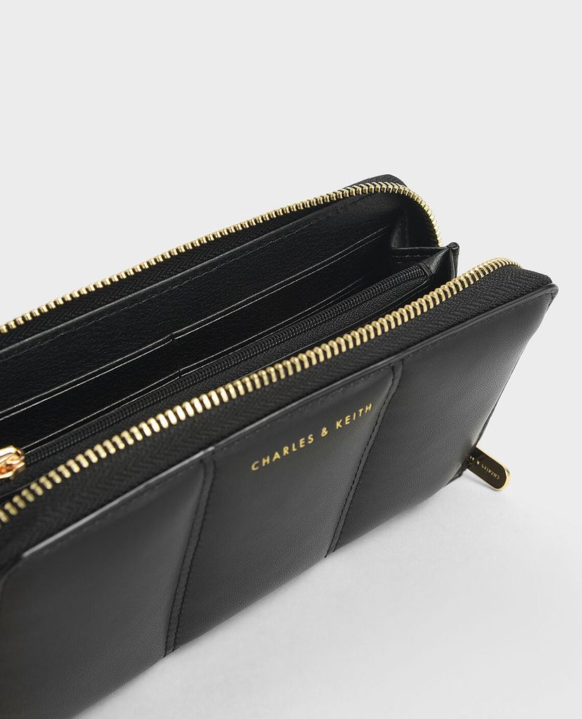 CHARLES & KEITH - Ví cầm tay nữ chữ nhật Mini Zip Around Quilted Tassel