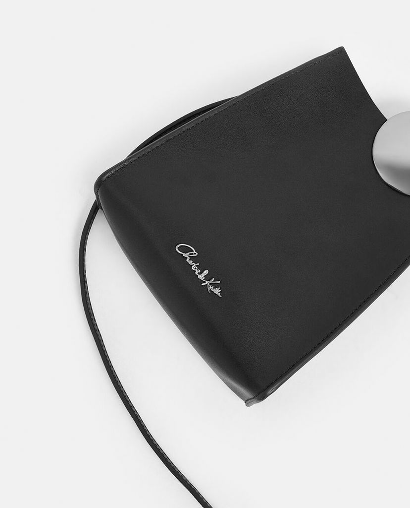 CHARLES & KEITH - Túi đeo chéo nữ hình thang Chrome Detail Leather