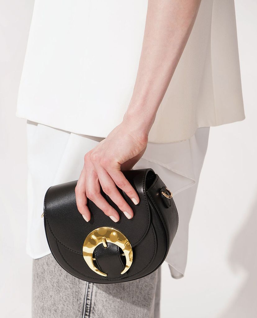 CHARLES & KEITH - Túi đeo chéo nữ Leather Saddle