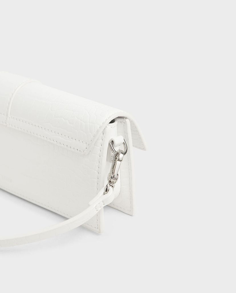 CHARLES & KEITH - Ví cầm tay nữ dáng dài Croc Effect