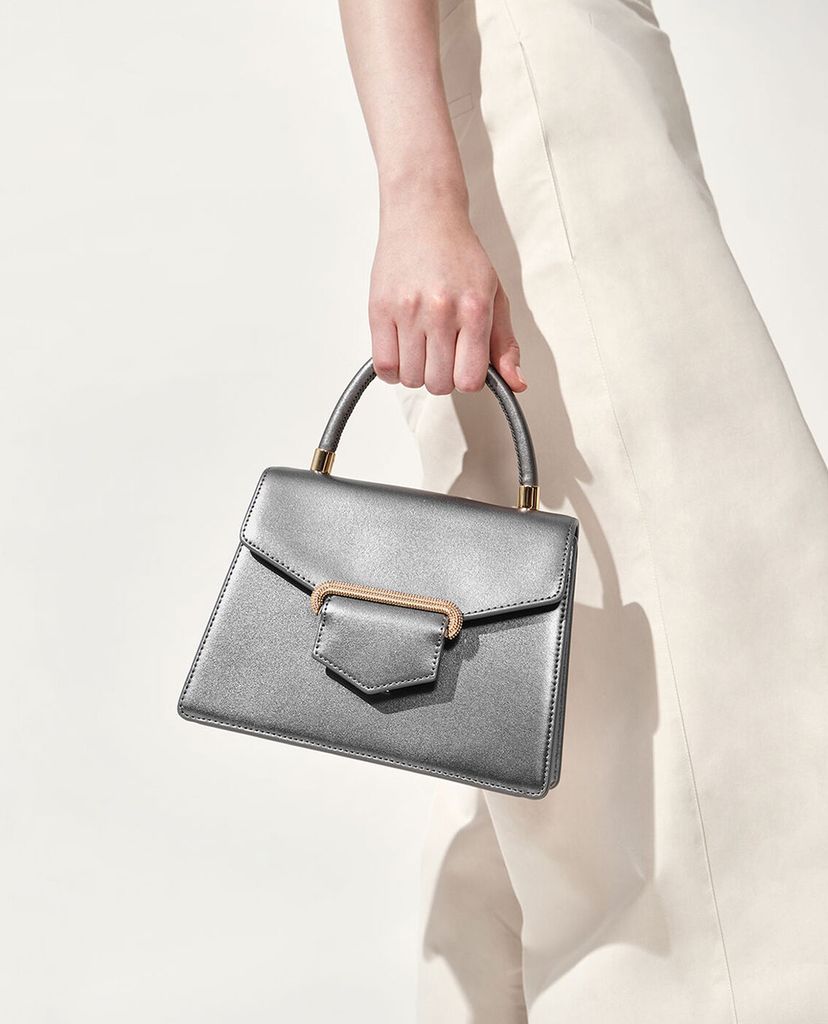CHARLES & KEITH - Túi xách tay hình thang Leather Metallic Accent