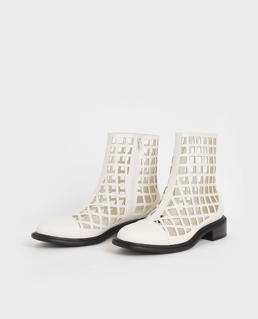 CHARLES & KEITH - Giày boots nữ mũi nhọn Caged