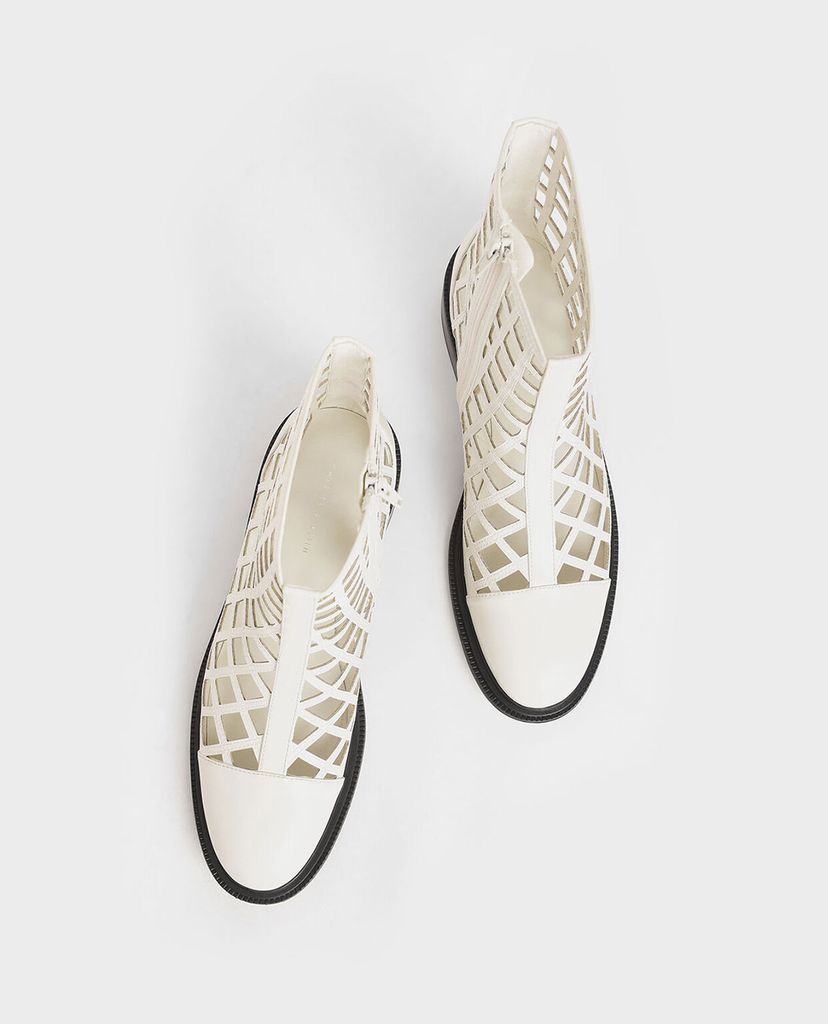CHARLES & KEITH - Giày boots nữ mũi nhọn Caged