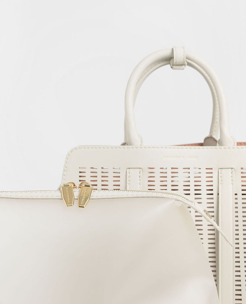 CHARLES & KEITH - Túi xách tay hình thang Large Laser Cut