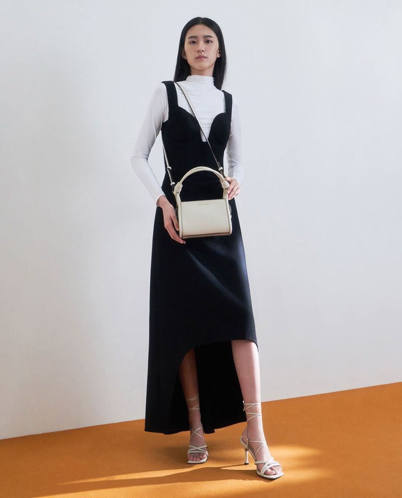 CHARLES & KEITH - Túi đeo vai nữ chữ nhật chi tiết tay cầm xoắn thời trang