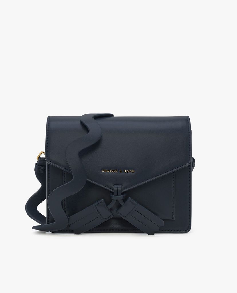 CHARLES & KEITH - Túi đeo chéo nữ chữ nhật Tassel Detail