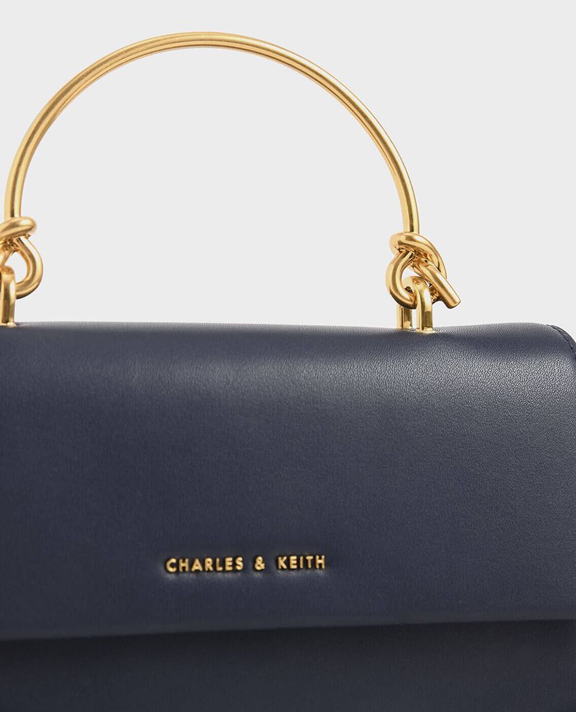 CHARLES & KEITH - Ví cầm tay nữ chữ nhật Metallic Handle