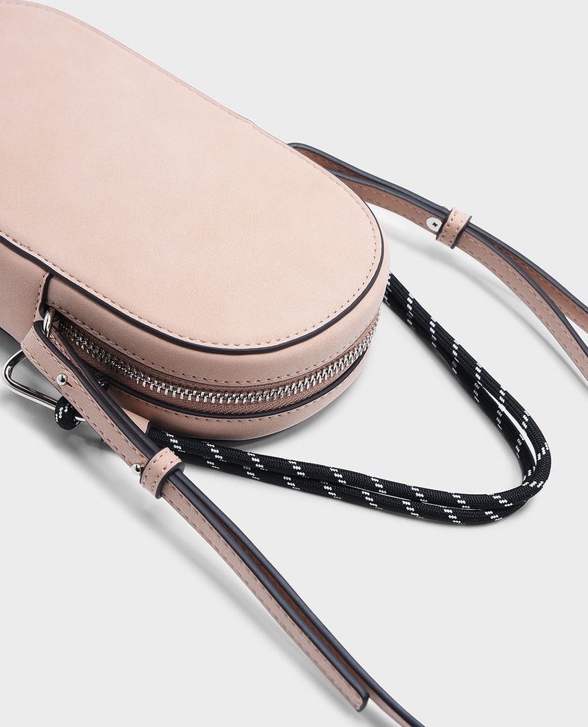 CHARLES & KEITH - Túi đeo chéo nữ hình bầu dục Rope Detail