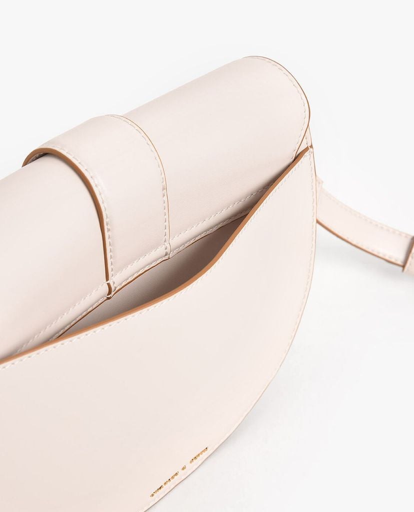 CHARLES & KEITH - Túi đeo vai nữ Metallic Buckle Saddle