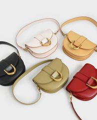 CHARLES & KEITH - Túi đeo vai nữ Mini Gabine Saddle