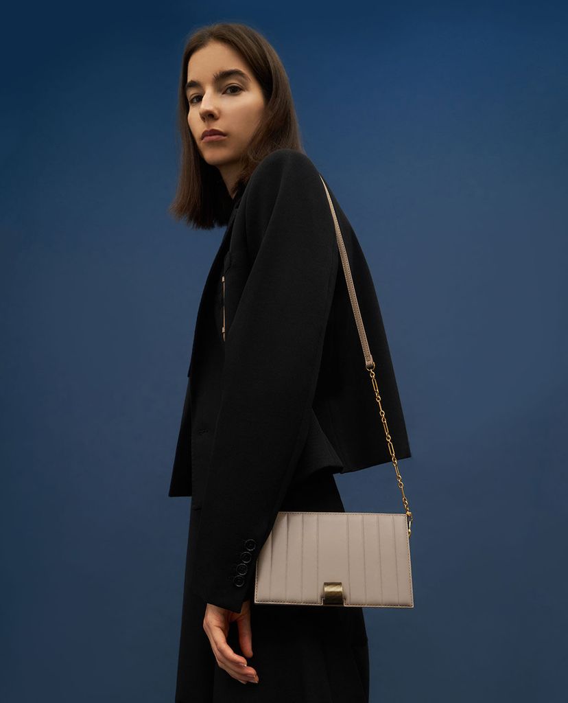 CHARLES & KEITH - Ví cầm tay nữ nắp gập Panelled Metallic Push Lock