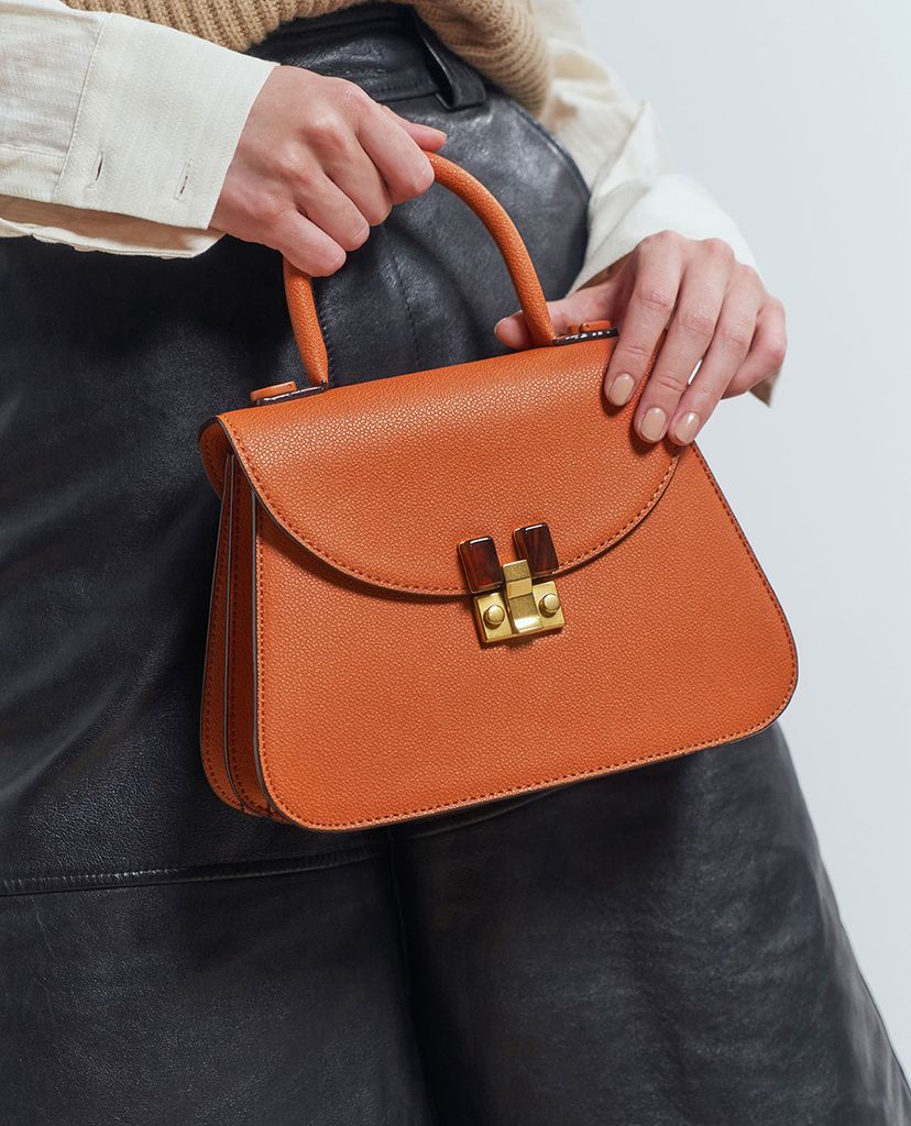 CHARLES & KEITH - Túi xách tay nữ hình thang Embellished Sculptural