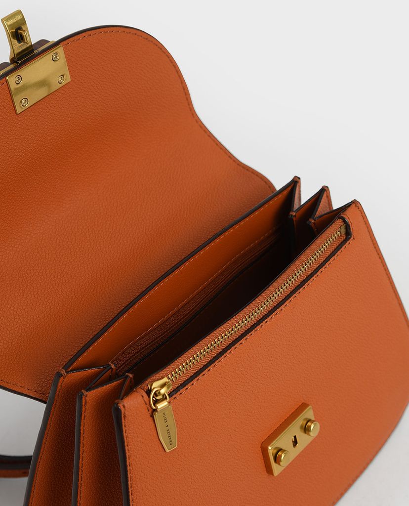 CHARLES & KEITH - Túi xách tay nữ hình thang Embellished Sculptural
