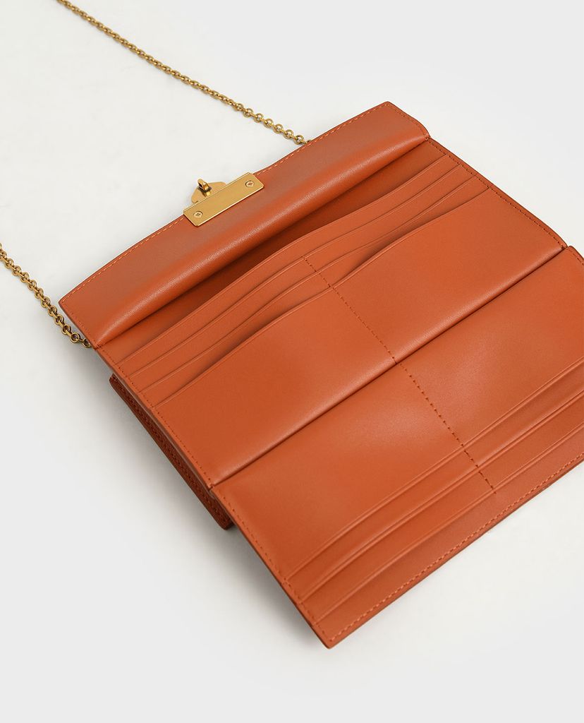 CHARLES & KEITH - Ví cầm tay nữ dáng dài Metallic Accent