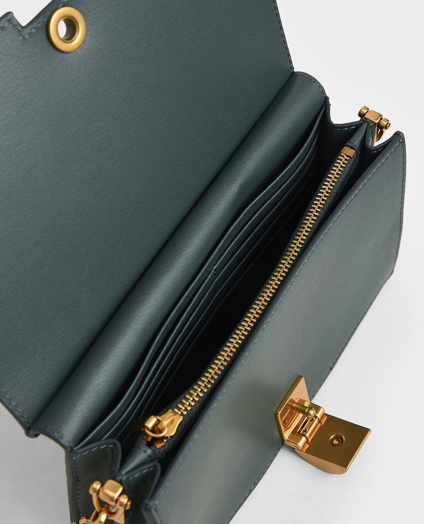 CHARLES & KEITH - Ví cầm tay nữ nắp gập Panelled Metallic Push Lock